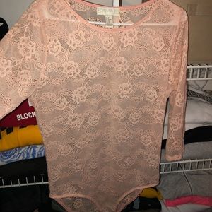 Light pink body suit